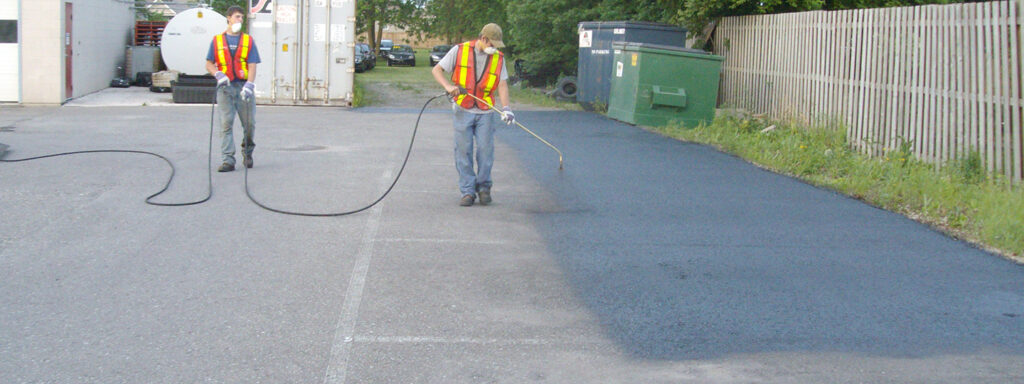 Parking lot asphalt spraying and restoration